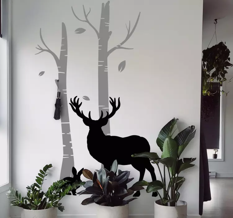 Perchero adhesivo ciervos cerca de los árboles - TenVinilo