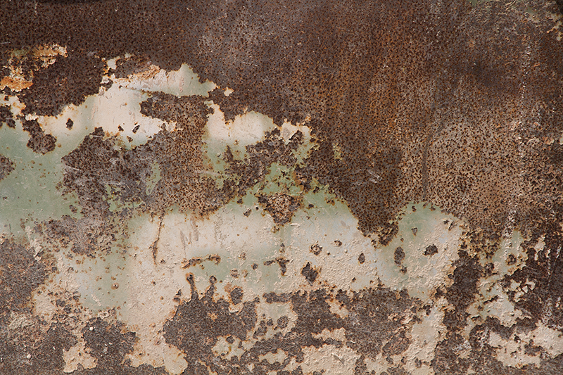 Alfombra vinílica imitación pared de metal oxidado - TenVinilo
